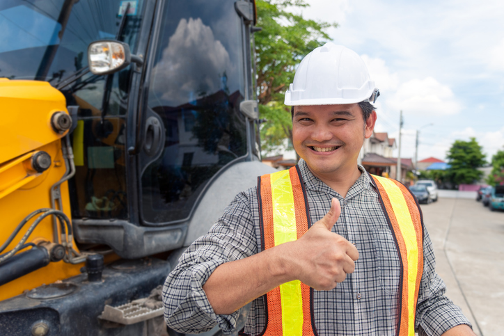 Man construction engineer at construction site